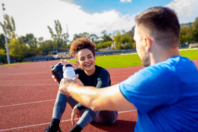 young-fitness-couple-resting-after-exercising-outd-2024-01-03-16-49-49-utc_1.jpg